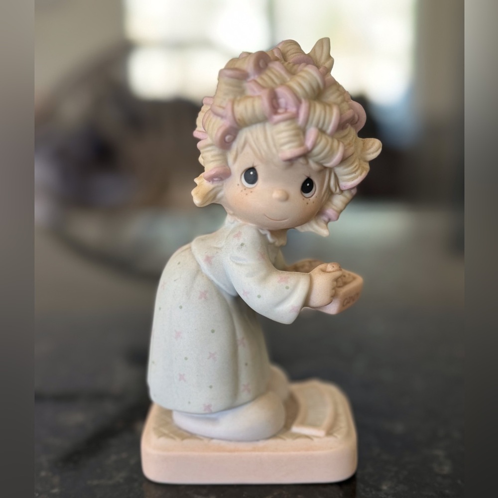 Precious moments girl on the scale